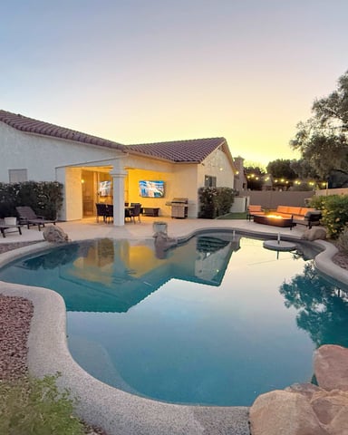 Pool at sunset at a Desert Pine Stays home in Chandler